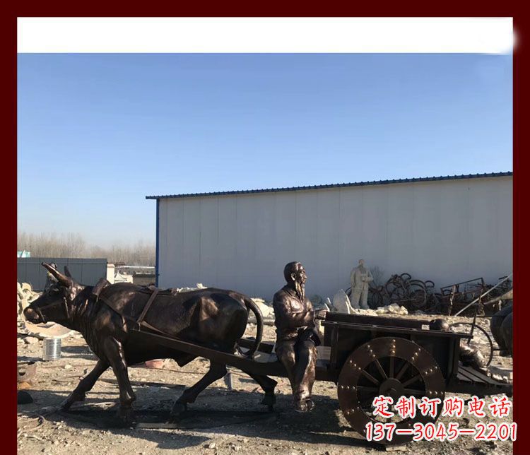兰州传统工艺技术精雕牛雕塑赶牛车的祖孙俩