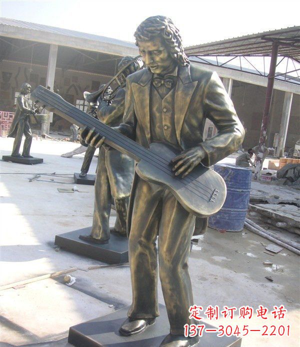 兰州西方人物铜吉他雕塑